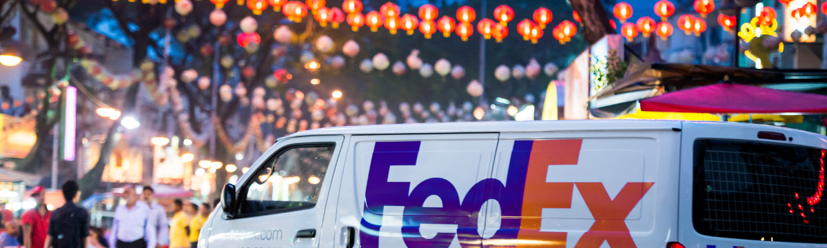 FedEx truck in a city 